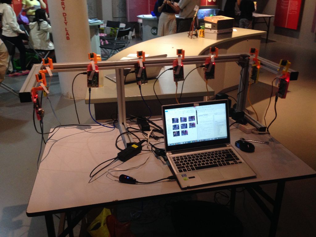 8 Raspberry Pis networked together to take simultaneous pictures and download them to a laptop